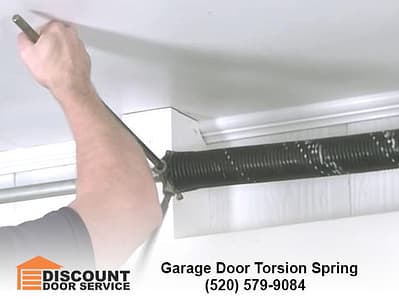 winding a torsion spring on a garage door in Tucson