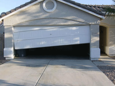 Broken-Garage-Door-Off-Track-repair
