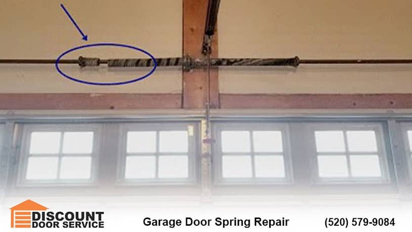 A broken garage door spring on a Tucson garage